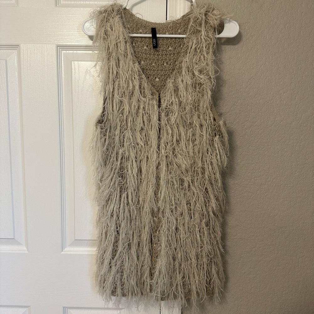 Elan brand, size large fringe vest
